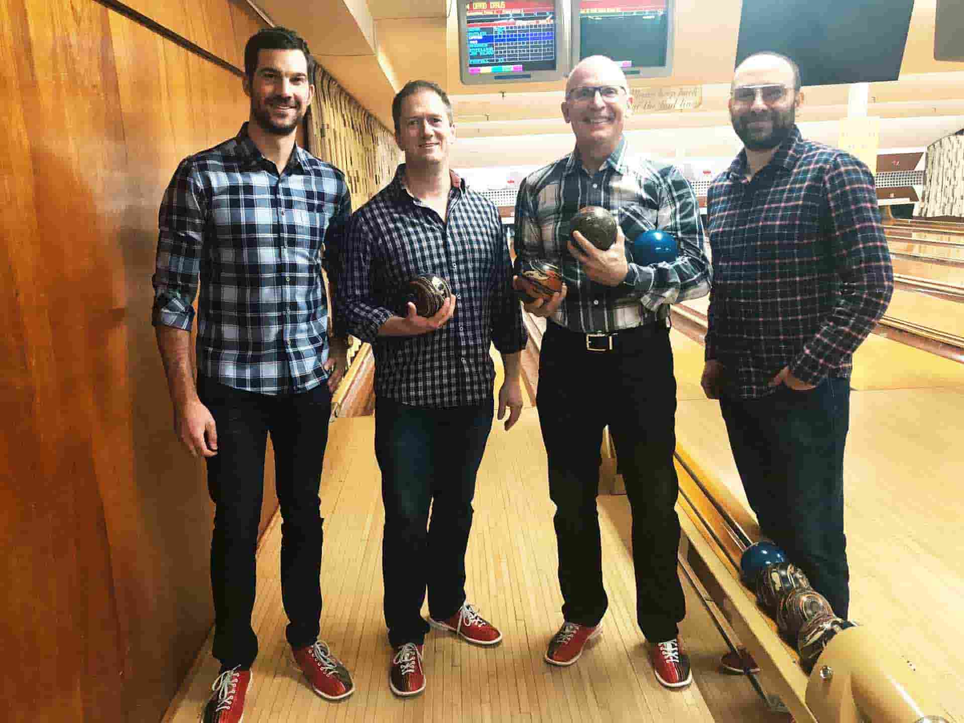 JLL team enjoying & getting clicked in a bowling arena