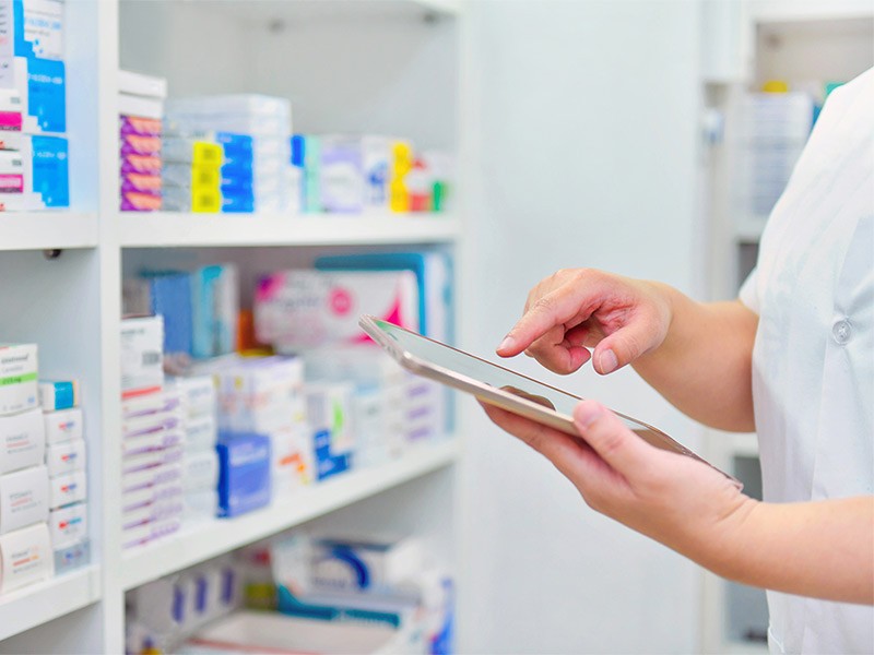 Women taking pharmacy stock