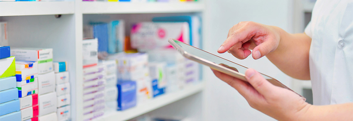 Women taking pharmacy stock