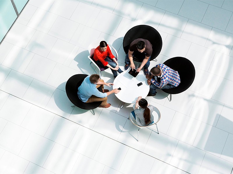 Group of professionals together and discussing