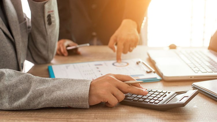 A person reviewing financial documents