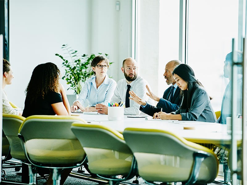 People discussing on meeting room